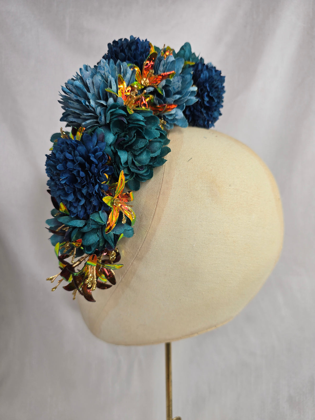 Large teal and iridescent orange large hair flower