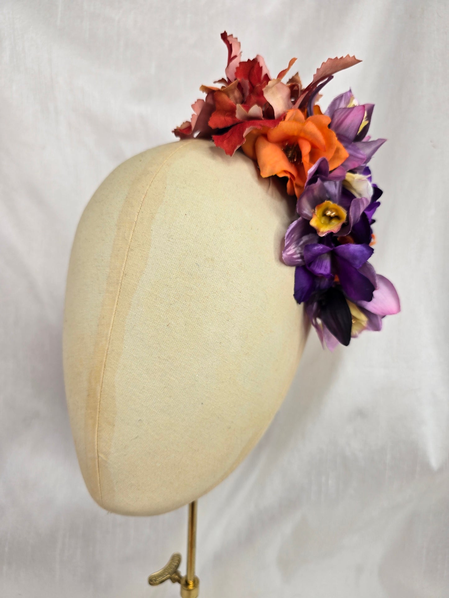 Large orange and purple orchid hair flower
