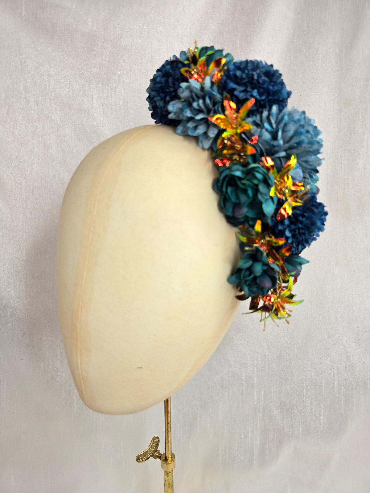 Large teal and iridescent orange large hair flower