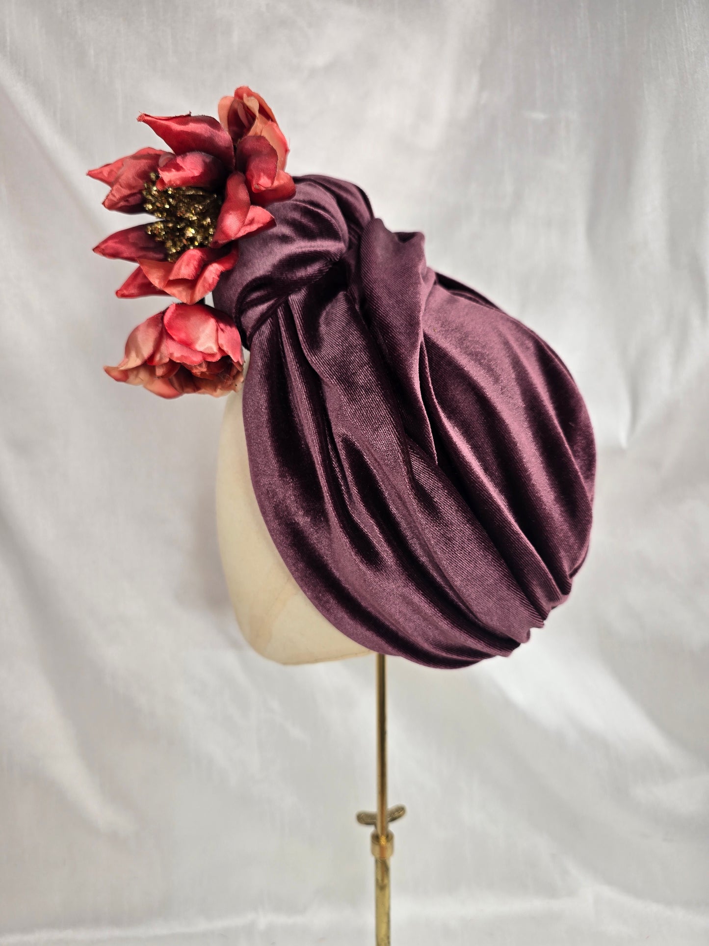 Plum brown stretch velvet turban with flower trim and corsage