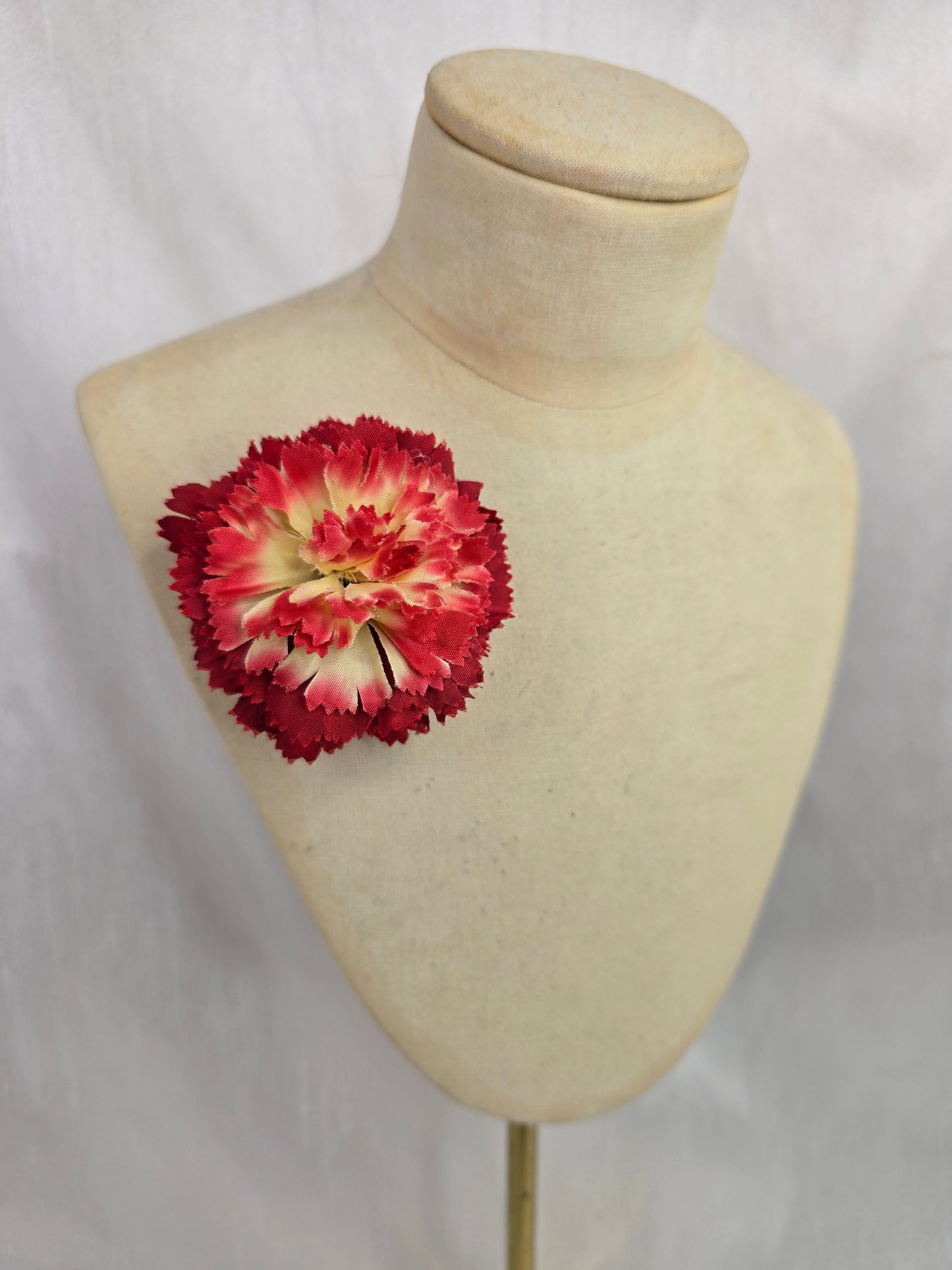 Classic mens red and pale yellow carnation buttonhole/bouttoniere